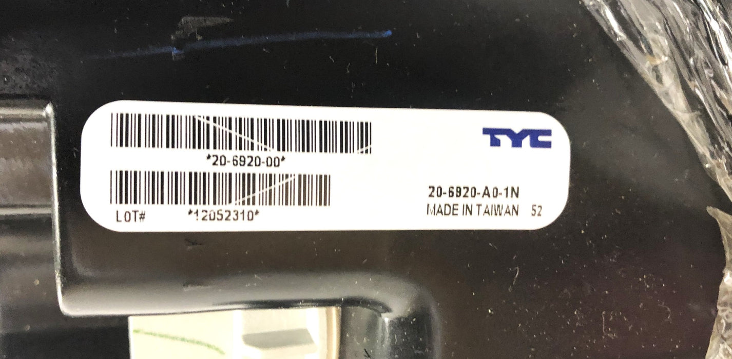 TYC Left Hand Halogen Headlight Assembly 20-6920-00 NOS