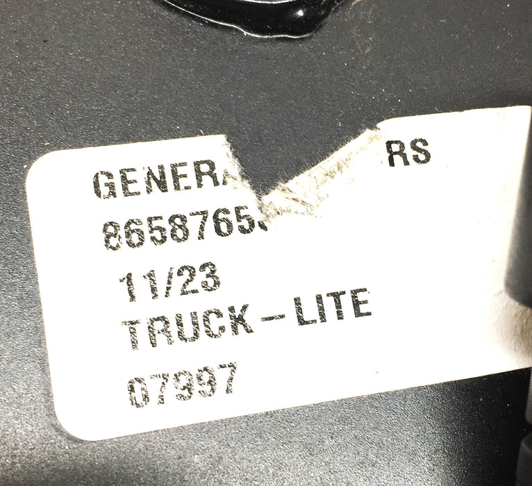 Truck-Lite/General Motors Stop/Turn/Tail Light with Bracket 86587653 USED