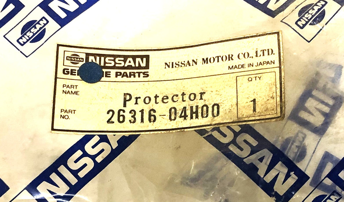 Nissan Lamp Protector 26316-04H00 NOS