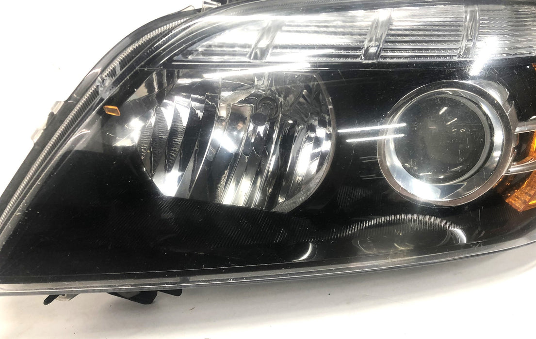 GM Driver Side Headlamp Assembly Chipped Amber Lens 92245554 (5554U) NOS