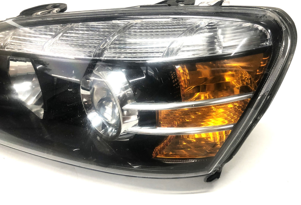 GM Driver Side Headlamp Assembly Chipped Amber Lens 92245554 (5554U) NOS