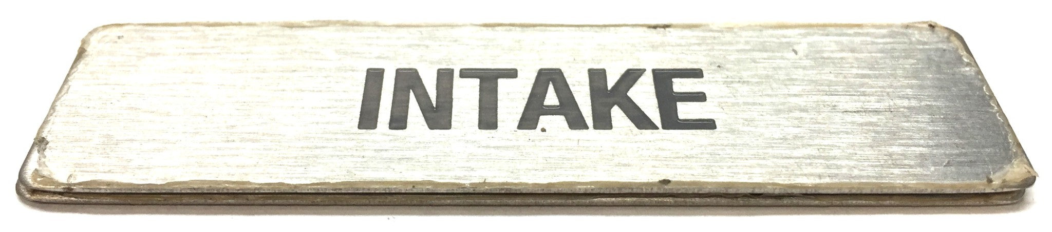 Unbranded 3/4" x 2-3/4" "INTAKE" Plate with Adhesive Backing 798183 NOS