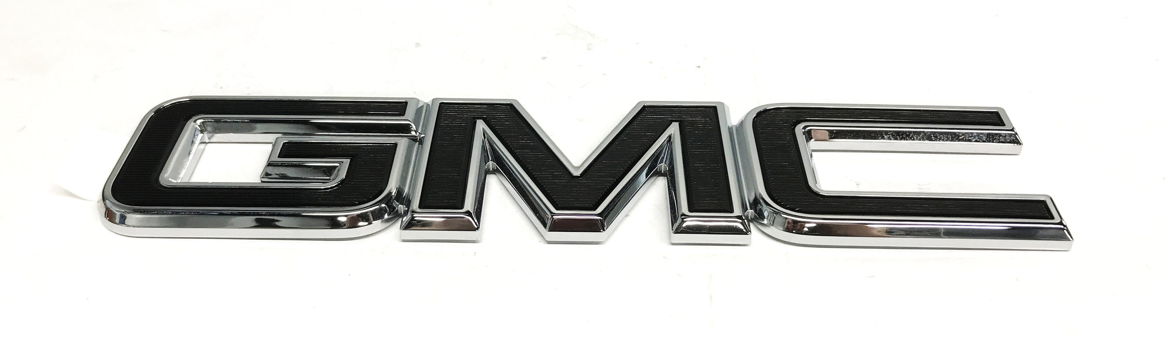 GM "GMC" Black Emblem Set 84395038 NOS