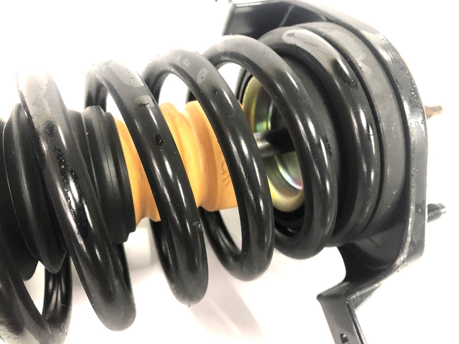 Monroe Quick-Strut Suspension Strut And Coil Spring Assembly 271311ST NOS